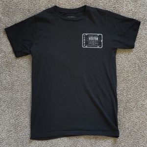 A black top with sliver designs from Harry Potter!